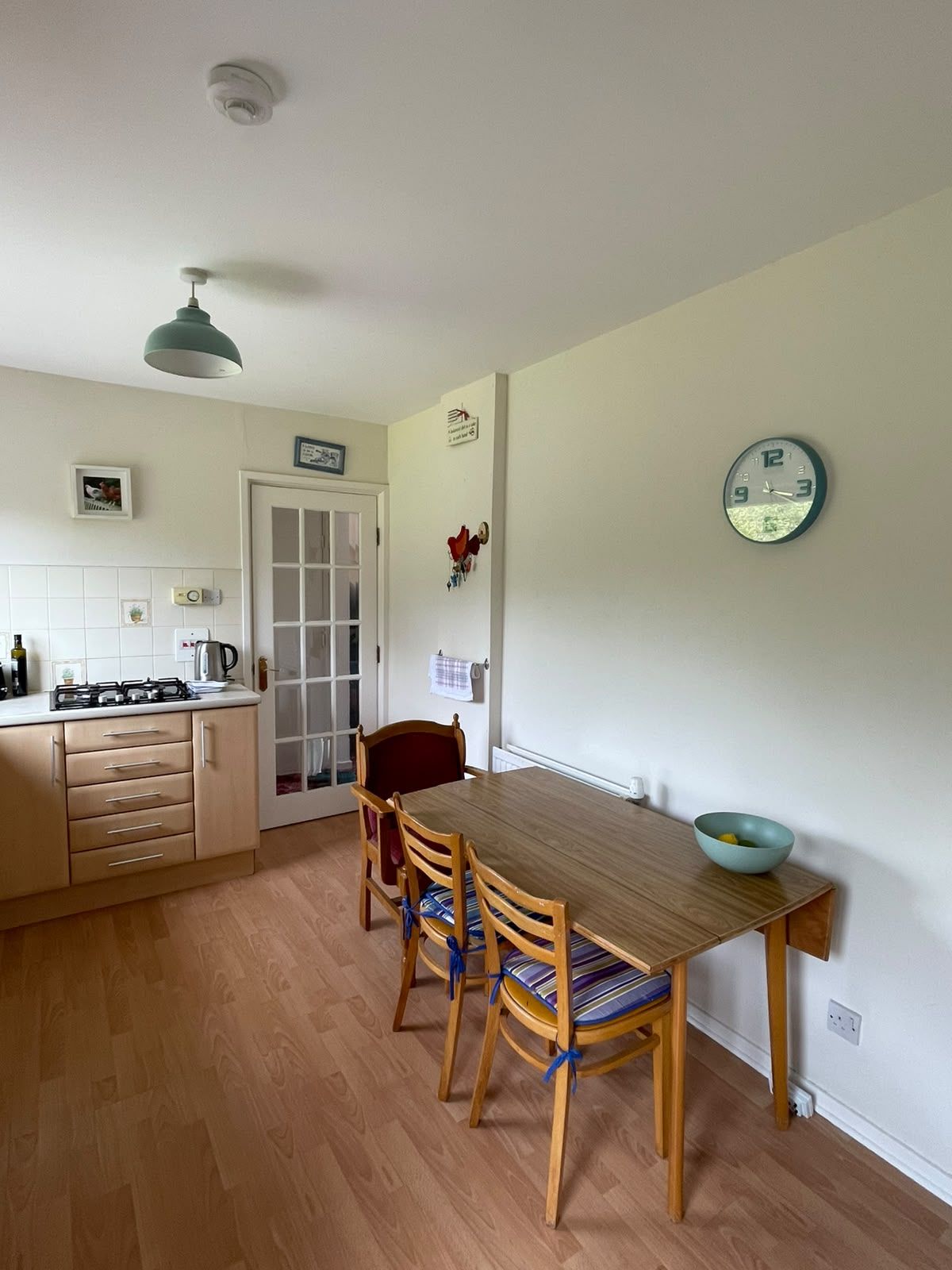 The sit-in kitchen with its dining table and chairs