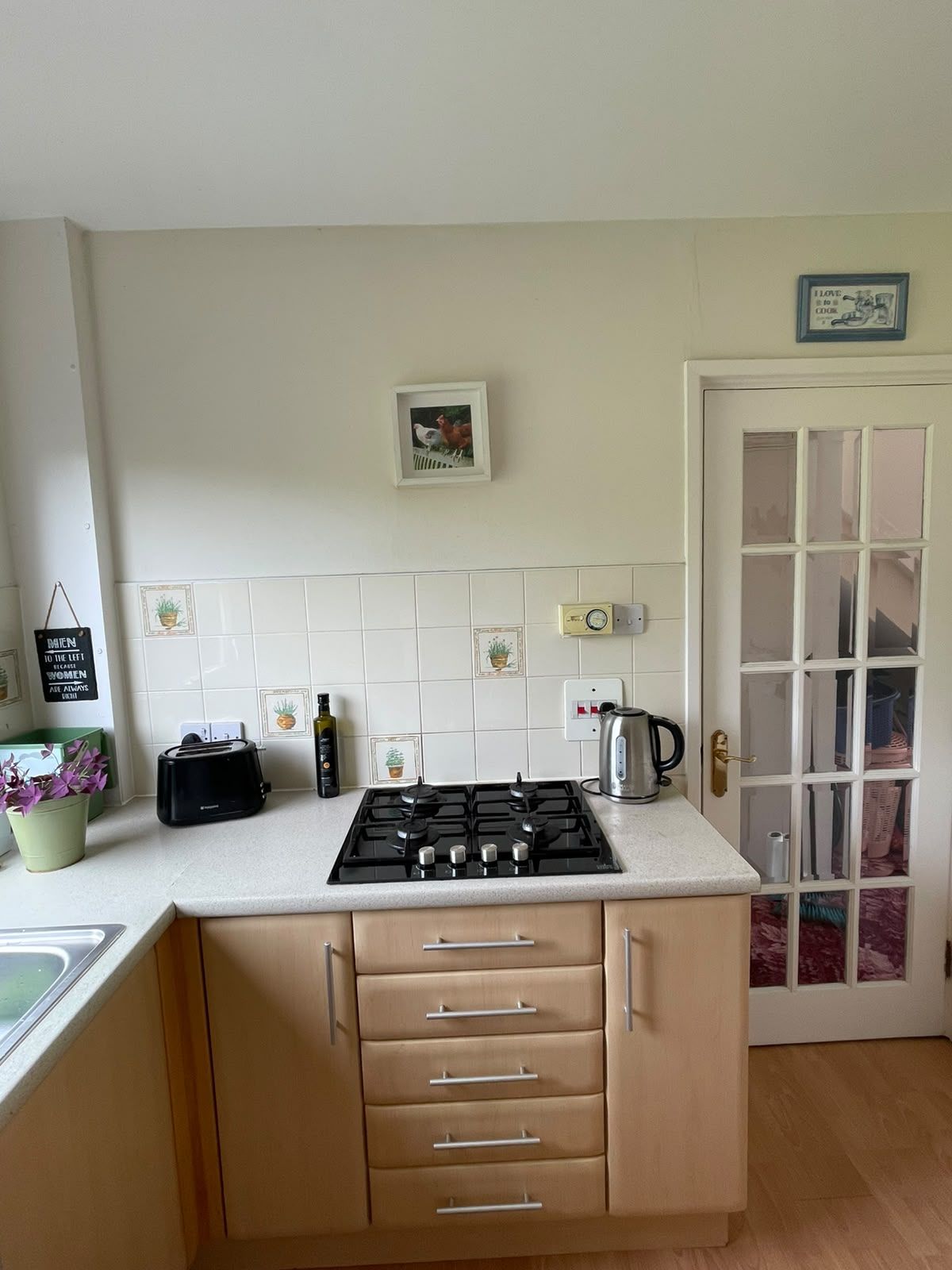 The gas hob, with kettle and toaster to either side