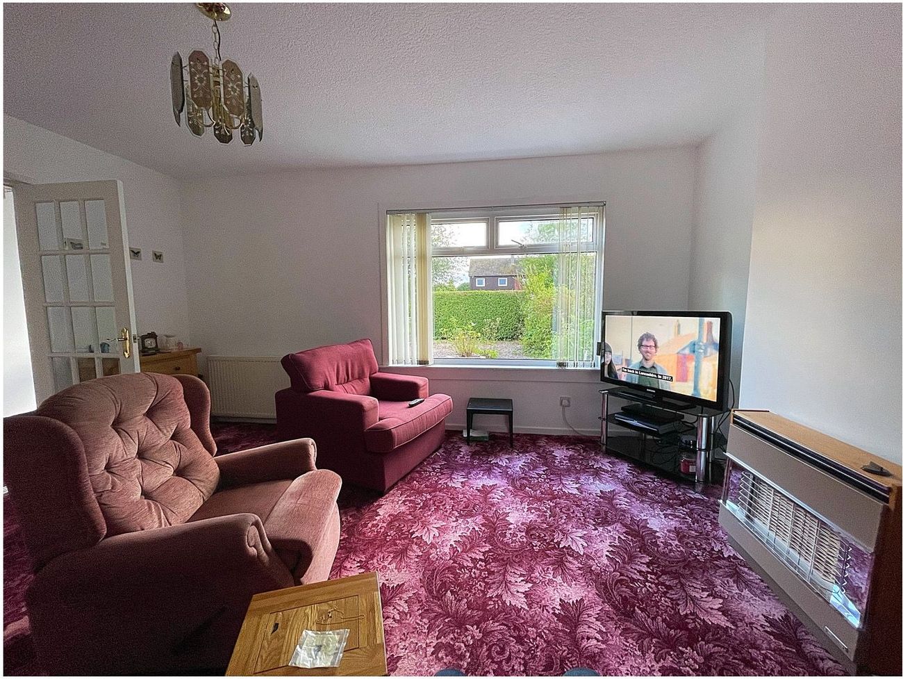 The living room with fireplace