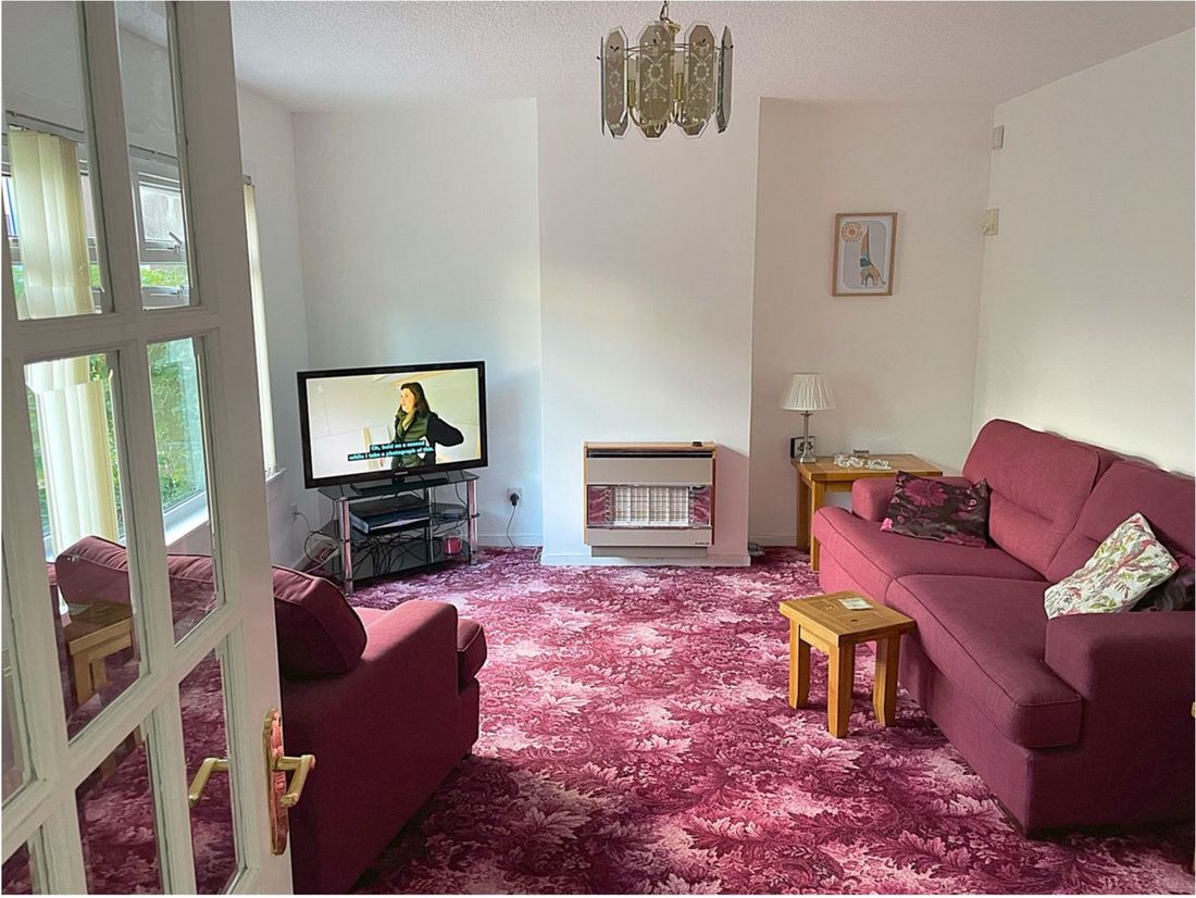 The living room and bay window